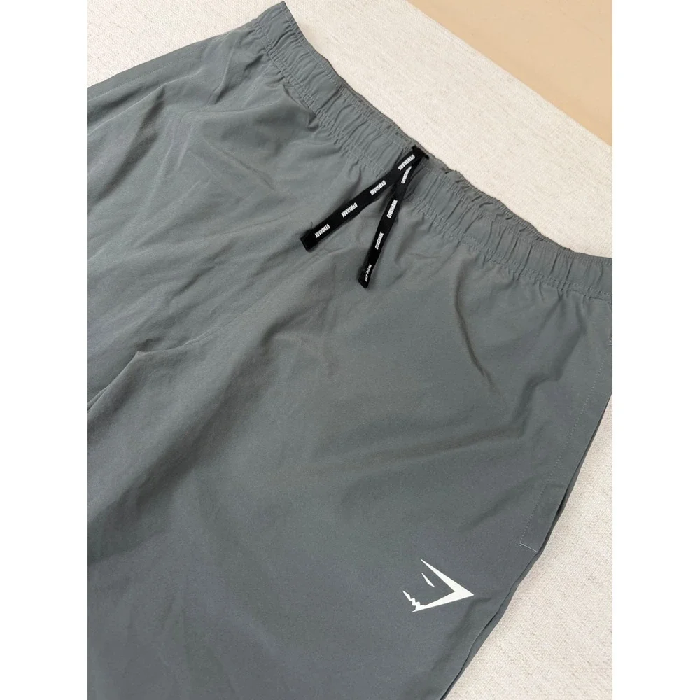 Gymshark Arrival Woven Joggers Mens Large Charcoal Grey Slim Tapered Zip Ankle